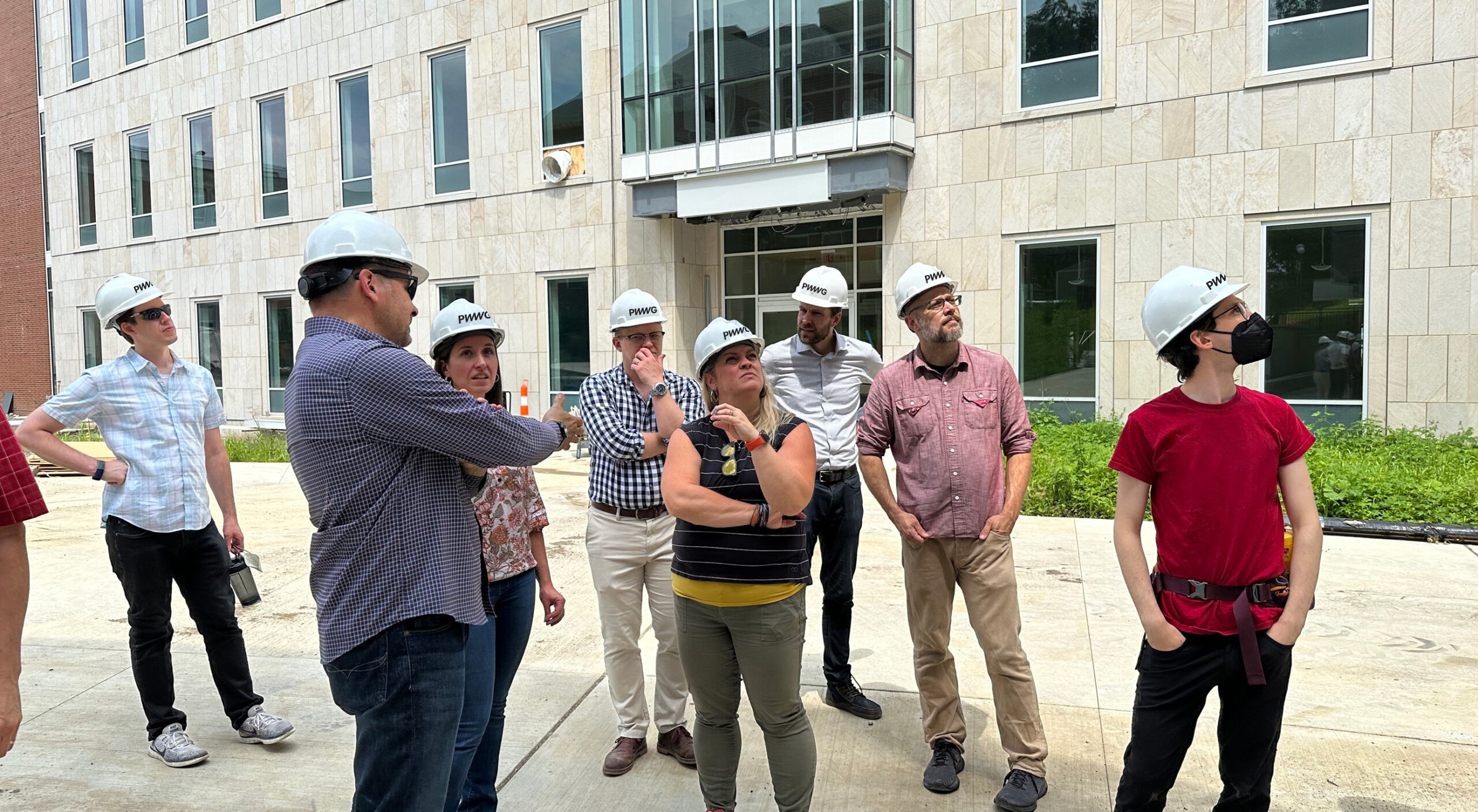A group of PWWG associates on site at a project.